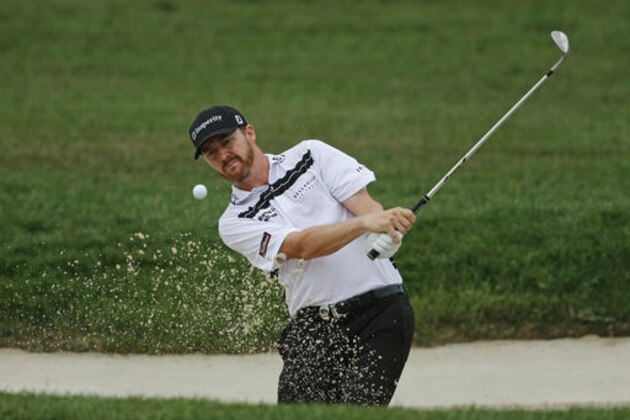 Jimmy Walker hits from a sand trap on the 10th hole during the third round of the PGA Championship golf tournament at Baltusrol Golf Club in Springfield, N.J., Sunday, July 31, 2016. (AP Photo/Mike Groll)