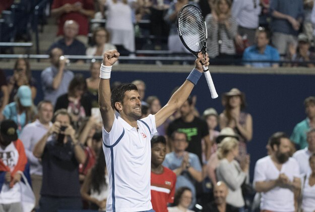 Jul 30, 2016; Toronto, Ontario, Canada; Novak Djokovic celebrates after winning the singles semi final match at the Rogers Cup tennis tournament at Aviva Centre. Novak Djokovic of Serbia won 6-3, 6-2. Mandatory Credit: Nick Turchiaro-USA TODAY Sports