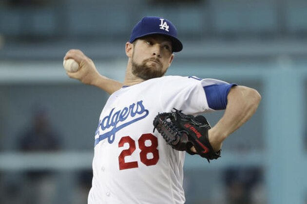Los Angeles Dodgers starting pitcher Bud Norris throws against the Tampa Bay Rays during the first inning of a baseball game Tuesday, July 26, 2016, in Los Angeles. (AP Photo/Jae C. Hong)