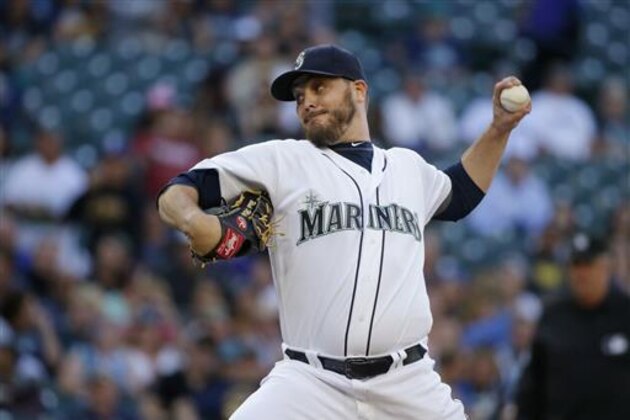 Seattle Mariners starting pitcher Wade Miley throws against the Chicago White Sox in the first inning of a baseball game, Tuesday, July 19, 2016, in Seattle. (AP Photo/Ted S. Warren)