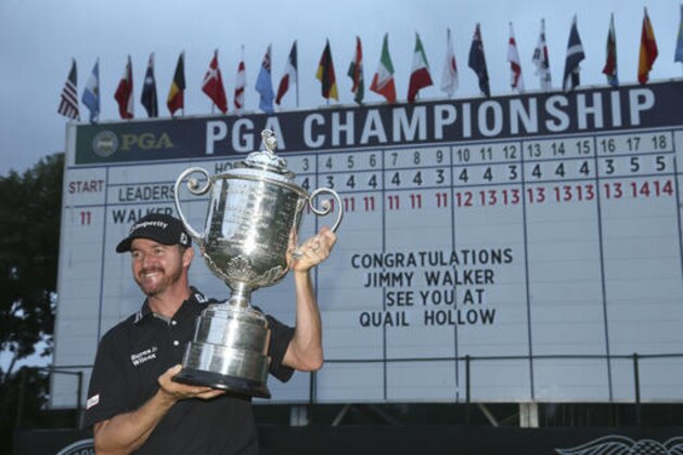 Jimmy Walker poses with the trophy after winning the PGA Championship golf tournament at Baltusrol Golf Club in Springfield, N.J., Sunday, July 31, 2016. (AP Photo/Seth Wenig)