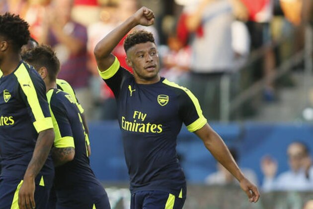Arsenal's Alex Oxlade-Chamberlain celebrates his goal against Chivas Guadalajara during the second half of a friendly soccer match in Carson, Calif., Sunday, July 31, 2016. (AP Photo/Danny Moloshok)