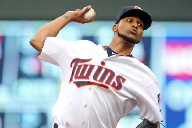 Minnesota Twins pitcher Ervin Santana throws against the Atlanta Braves during the first inning of a baseball game Tuesday, July 26, 2016, in Minneapolis. (AP Photo/Jim Mone)