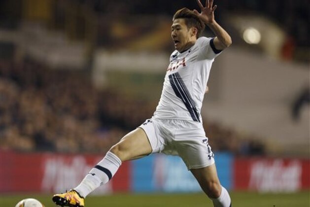 Tottenham’s Son Heung-Min during the Europa League round of 16 second leg soccer match between Tottenham Hotspur and Borussia Dortmund at the White Hart Lane stadium in London, England, Friday, March 18, 2016 . (AP Photo/Frank Augstein)
