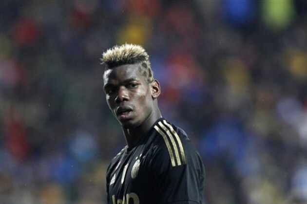 Juventus’ Paul Pogba walks on the pitch during a Serie A soccer match between Frosinone and Juventus, at Frosinone's Comunale stadium, Sunday, Feb. 7, 2016. (AP Photo/Riccardo De Luca)