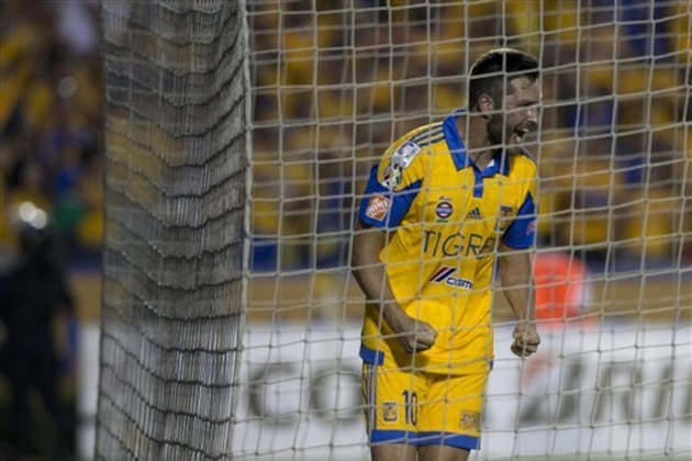 Andre Gignac of Mexico's Tigres celebrates an own goal by Brazil's Internacional during a Copa Libertadores semifinal soccer game in Monterrey, Mexico, Wednesday, July 22, 2015. (AP Photo/Eduardo Verdugo)