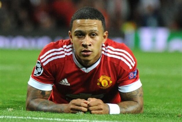 Manchester United’s Memphis Depay during the Champions League play-off round, first leg soccer match between Manchester United and Club Brugge at Old Trafford, Manchester, England, Tuesday, Aug. 18, 2015. (AP Photo/Rui Vieira)