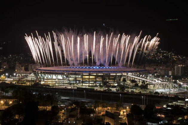 Fireworks explode above the Maracana stadium during the rehearsal of the opening ceremony of the Olympic Games in Rio de Janeiro, Brazil, Sunday, July 31, 2016. (AP Photo/Felipe Dana)