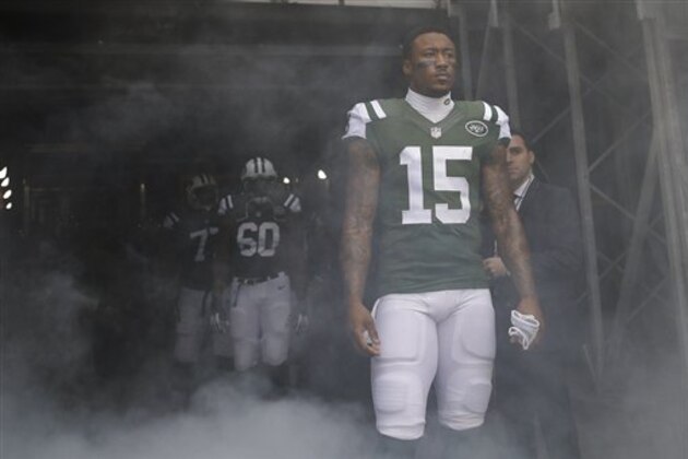 New York Jets wide receiver Brandon Marshall (15) is announced for the first half of an NFL football game against the New England Patriots Sunday, Dec. 27, 2015, in East Rutherford, N.J. (AP Photo/Seth Wenig)