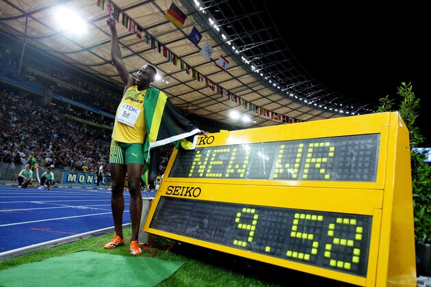 BERLIN - AUGUST 16:  Usain Bolt of Jamaica celebrates winning the gold medal in the men's 100 Metres Final during day two of the 12th IAAF World Athletics Championships at the Olympic Stadium on August 16, 2009 in Berlin, Germany. Bolt set a new World Record of 9.58.  (Photo by Mark Dadswell/Getty Images)