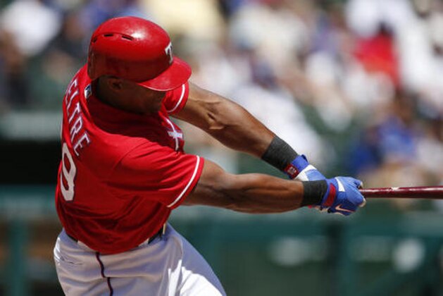 Texas Rangers' Adrian Beltre follows through on a single against the Kansas City Royals during the fourth inning of a baseball game, Sunday, July 31, 2016, in Arlington, Texas. (AP Photo/Jim Cowsert)