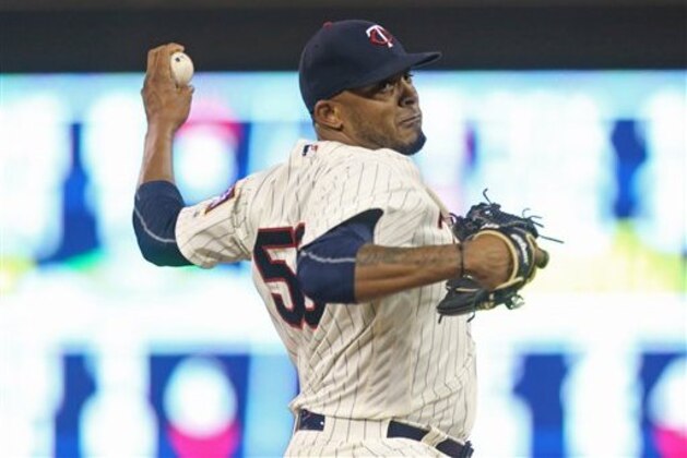 Minnesota Twins pitcher Fernando Abad throws against the Cleveland Indians in a baseball game Saturday, July 16, 2016, in Minneapolis. (AP Photo/Jim Mone)