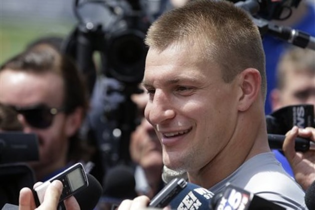 New England Patriots tight end Rob Gronkowski, speaks with reporters following an NFL football training camp practice Thursday, July 28, 2016, in Foxborough, Mass. (AP Photo/Steven Senne)