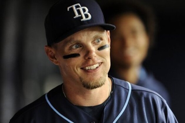 Tampa Bay Rays outfielder Brandon Guyer walks in the dugout before the start of a baseball game against the Boston Red Sox Wednesday, June 29, 2016, in St. Petersburg, Fla. (AP Photo/Steve Nesius)