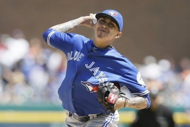Toronto Blue Jays relief pitcher Jesse Chavez throws during the sixth inning of a baseball game against the Detroit Tigers, Wednesday, June 8, 2016, in Detroit. (AP Photo/Carlos Osorio)