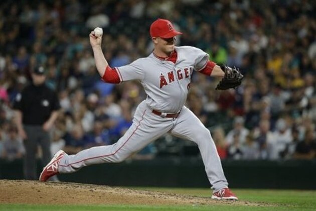 Los Angeles Angels' Joe Smith throws against the Seattle Mariners in the eighth inning of a baseball game, Friday, May 13, 2016, in Seattle. (AP Photo/Ted S. Warren)