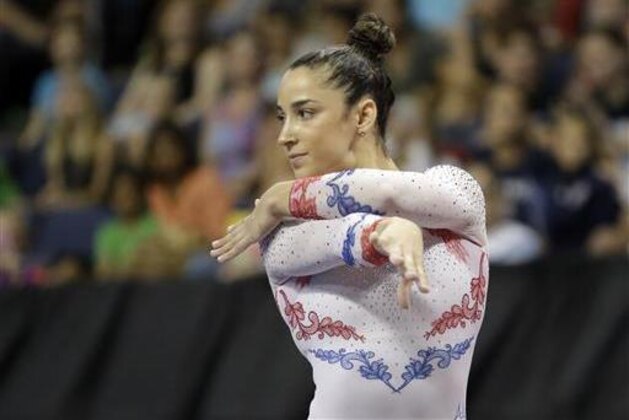 Aly Raisman competes in the floor exercise during the U.S. women's gymnastics championships Sunday, June 26, 2016, in St. Louis. (AP Photo/Jeff Roberson)