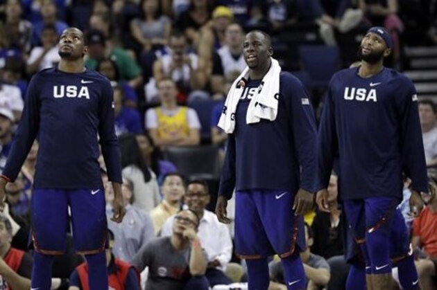 United States' Kevin Durant, Draymond Green and DeMarcus Cousins during the first half of an exhibition basketball game against China Tuesday, July 26, 2016, in Oakland, Calif. (AP Photo/Marcio Jose Sanchez)