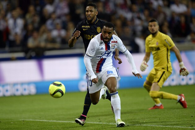 Lyon's French forward Alexandre Lacazette runs after the ball to score a goal during the French L1 football match between Olympique Lyonnais (OL) and Association sportive de Monaco (ASM) at the Parc de l'Olympique Lyonnais in Decines-Charpieu, central eastern France, on May 7, 2016. / AFP / ROMAIN LAFABREGUE        (Photo credit should read ROMAIN LAFABREGUE/AFP/Getty Images)