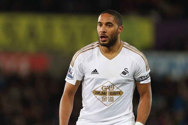SWANSEA, WALES - JANUARY 18:  Ashley Williams of Swansea City during the Barclays Premier League match between Swansea City and Watford at the Liberty Stadium on January 18, 2016 in Swansea, Wales.  (Photo by Matthew Ashton - AMA/Sports Photo Agency)