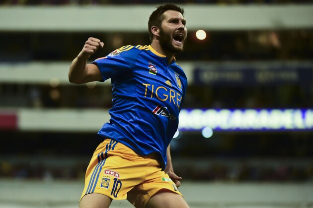 Andre Gignac of Tigres celebrates his goal against America, during their Mexican Apertura 2016 tournament football match, at the Azteca stadium, on July 30, 2016, in Mexico City.  / AFP / RONALDO SCHEMIDT        (Photo credit should read RONALDO SCHEMIDT/AFP/Getty Images)