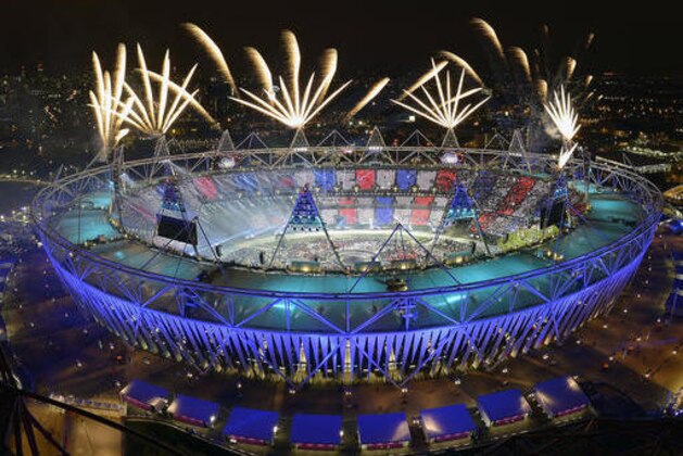 FILE - In this July 28, 2012, file photo, fireworks illuminate the sky over the Olympic Stadium during Opening Ceremonies at the 2012 Summer Olympics in London. Always splashy affairs, the parade of athletes this time around will take place Friday night, Aug. 5, 2016,  at Maracana Stadium with a country-by-country show of fashion, along with speeches, flag-raising and the lighting of the Olympic cauldron. The idea is to showcase the host country's culture, something that has earned oohhs and aahhs through time, usually also accompanied by some head-scratching as traditions and history play out. (AP Photo/Mark J. Terrill, File)