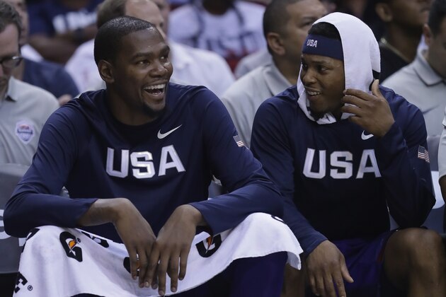 HOUSTON, TX - AUGUST 01:  (L-R) Kevin Durant #5 and Kyle Lowry #7 of the United States during USA Basketball Showcase at Toyota Center on August 1, 2016 in Houston, Texas.  (Photo by Ronald Martinez/Getty Images)