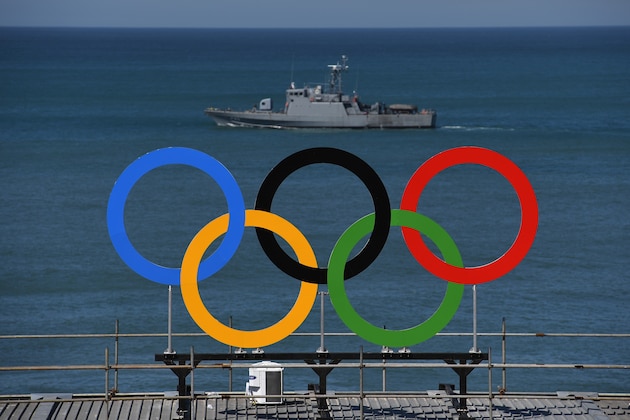 RIO DE JANEIRO, BRAZIL - AUGUST 01:  A military ship patrols the coast off Copacabana Beach on August 1, 2016 in Rio de Janeiro, Brazil.  (Photo by Shaun Botterill/Getty Images)