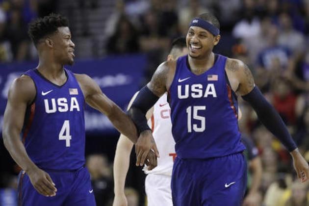 United States' Carmelo Anthony, right, celebrates after scoring, alongside teammate Jimmy Butler during the second half of an exhibition basketball game against China on Tuesday, July 26, 2016, in Oakland, Calif. The United States won 107-57. (AP Photo/Marcio Jose Sanchez)