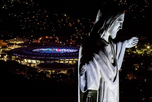 RIO DE JANEIRO, BRAZIL - JULY 31:  The Christ the Redeemer statue and Maracana Stadium are seen on July 31, 2016 in Rio de Janeiro, Brazil. Rio 2016 will be the first Olympic Games in South America. The event will take place between August 5-21. (Photo by Buda Mendes/Getty Images)