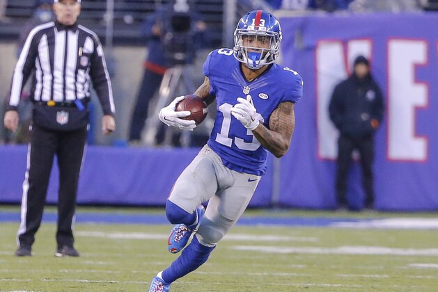 Dec 20, 2015; East Rutherford, NJ, USA;  New York Giants wide receiver Odell Beckham (13) runs for long gain after pass reception during the fourth quarter against the Carolina Panthers at MetLife Stadium. Carolina Panthers defeat the New York Giants 38-35. Mandatory Credit: Jim O'Connor-USA TODAY Sports
