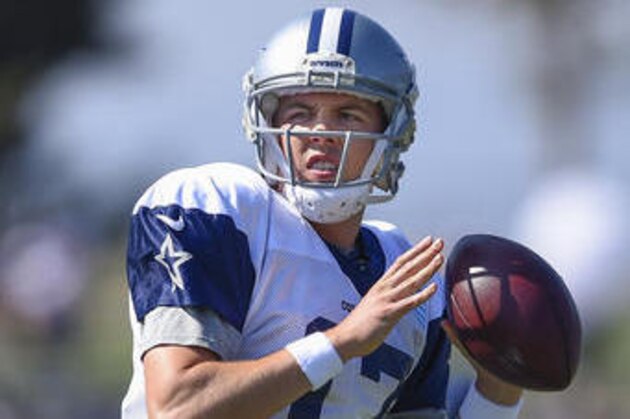 Dallas Cowboys quarterback Kellen Moore looks for the open man during Dallas Cowboys' NFL football training camp, Monday, Aug. 1, 2016, in Oxnard, Calif. (AP Photo/Gus Ruelas)