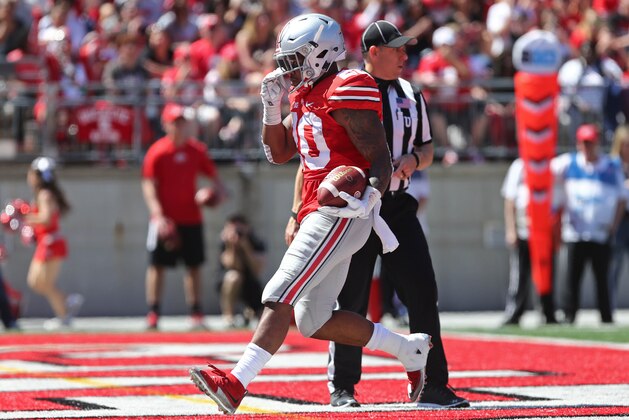 Apr 16, 2016; Columbus, OH, USA; Ohio State Scarlet Team running back Mike Weber (20) scores a touchdown against the Ohio State Gray Team during the Ohio State Spring Game at Ohio Stadium. Mandatory Credit: Aaron Doster-USA TODAY Sports