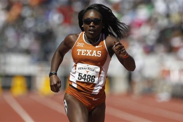 Texas' Morolake Akinosun competes in the women's 100-meter dash during the Texas Relays, Saturday, April 2, 2016, in Austin, Texas. (AP Photo/Stephen Spillman)