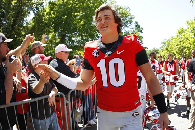 Apr 16, 2016; Athens, GA, USA; Georgia Bulldogs quarterback Jacob Eason (10) greets fans during the Dawg Walk before the spring game at Sanford Stadium. Mandatory Credit: Brett Davis-USA TODAY Sports