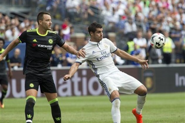 Chelsea defender John Terry, left, defends Real Madrid forward Alvaro Morata in the first half of an International Champions Cup soccer match, Saturday, July 30, 2016, in Ann Arbor, Mich. (AP Photo/Tony Ding)