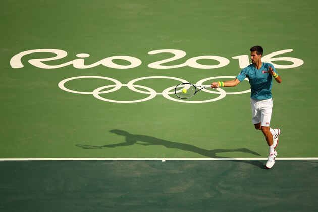 RIO DE JANEIRO, BRAZIL - AUGUST 02:  Novak Djokovic of Serbia plays a forehand during a practice session ahead of the Rio 2016 Olympic Games at the Olympic Tennis Centre on August 2, 2016 in Rio de Janeiro, Brazil.  (Photo by Clive Brunskill/Getty Images)