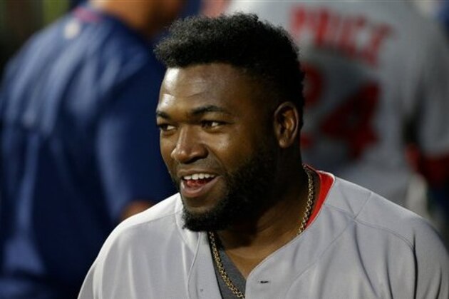 Boston Red Sox' David Ortiz smiles in the dugout during a baseball game against the Seattle Mariners, Tuesday, Aug. 2, 2016, in Seattle. (AP Photo/Ted S. Warren)