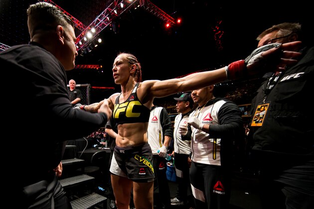 CURITIBA, BRAZIL - MAY 14: Cris 'Cyborg' Justino of Brazil prepares to enter the Octagon before facing Leslie Smith of the United States in their catchweight bout during the UFC 198 at Arena da Baixada stadium on May 14, 2016 in Curitiba, Brazil. (Photo by Buda Mendes/Zuffa LLC/Zuffa LLC via Getty Images)