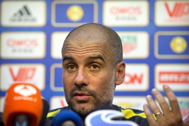 Manchester City manager Pep Guardiola, speaks during a press conference at the Olympic Sports Center Stadium in Beijing, Sunday, July 24, 2016. Manchester City will play a friendly soccer match against Manchester United in Beijing on Monday night. (AP Photo/Mark Schiefelbein)