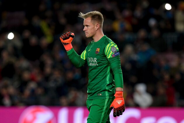 Barcelona's German goalkeeper Marc-Andre ter Stegen celebrates after saving his goal from a penalty kick during the UEFA Champions League Group E football match FC Barcelona vs AS Roma at the Camp Nou stadium in Barcelona on November 24, 2015.    / AFP / JOSEP LAGO        (Photo credit should read JOSEP LAGO/AFP/Getty Images)