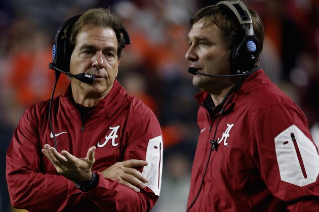 GLENDALE, AZ - JANUARY 11:  Head coach Nick Saban and Defensive coordinator Kirby Smart of the Alabama Crimson Tide look on from the field during the 2016 College Football Playoff National Championship Game against the Clemson Tigers at University of Phoenix Stadium on January 11, 2016 in Glendale, Arizona.  (Photo by Sean M. Haffey/Getty Images)