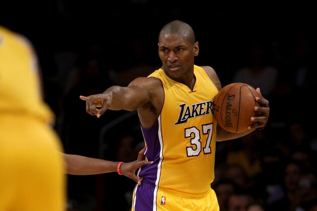 LOS ANGELES, CA - APRIL 06:  Metta World Peace #37 of the Los Angeles Lakers points to a teammate during the first half of an NBA game against the Los Angeles Clippers on April 6, 2016 at Staples Center in Los Angeles, California. NOTE TO USER: User expressly acknowledges and agrees that, by downloading and or using this photograph, User is consenting to the terms and conditions of the Getty Images License Agreement. (Photo by Sean M. Haffey/Getty Images)> at Staples Center on April 6, 2016 in Los Angeles, California.  (Photo by Sean M. Haffey/Getty Images)
