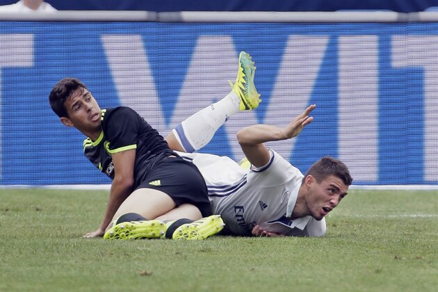 ANN ARBOR, MI - JULY 30:  Mateo Kovacic #16 of Real Madrid looks for a foul after being tripped up by Oscar #8 of Chelsea at Michigan Stadium on July 30, 2016 in Ann Arbor, Michigan. (Photo by Duane Burleson/Getty Images)