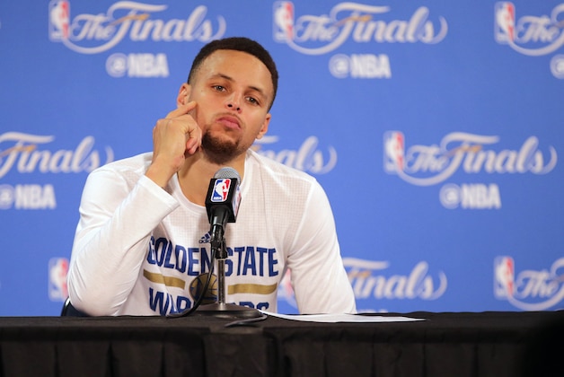 June 19, 2016; Oakland, CA, USA; Golden State Warriors guard Stephen Curry (30) reacts while speaking to media following the 93-89 loss against the Cleveland Cavaliers in game seven of the NBA Finals at Oracle Arena. Mandatory Credit: Kelley L Cox-USA TODAY Sports
