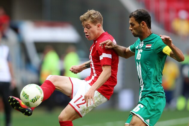 BRASILIA, BRAZIL - AUGUST 04:  Borsting Frederik #12 of Denmark controls the ball against Saad Luabi #16 of Iraq at Mane Garrincha Stadium on August 4, 2016 in Brasilia, Brazil. (Photo by Celso Junior/Getty Images)