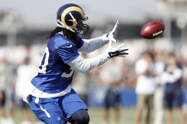 Los Angeles Rams running back Todd Gurley catches the football during the NFL football team's training camp, Saturday, July 30, 2016, in Irvine, Calif. (AP Photo/Ryan Kang)