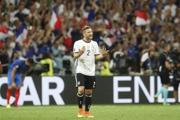 Germany's Shkodran Mustafi reacts after France's Antoine Griezmann scored during the Euro 2016 semifinal soccer match between Germany and France, at the Velodrome stadium in Marseille, France, Thursday, July 7, 2016. (AP Photo/Petr David Josek)