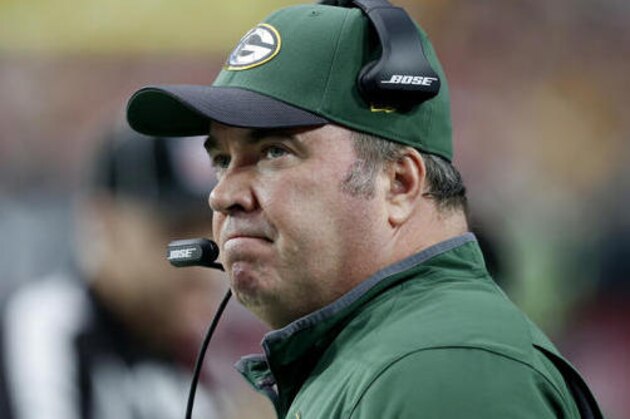 FILE - In this Dec. 27, 2015, file photo, Green Bay Packers head coach Mike McCarthy watches his team during the first half of an NFL football game against the Arizona Cardinals in Glendale, Ariz. McCarthy said Monday, July 25, 2016, quarterback Aaron Rodgers is in great shape as the team starts training camp, and that it's the best shape that he's seen Rodgers in their time together. (AP Photo/Ross D. Franklin, File)