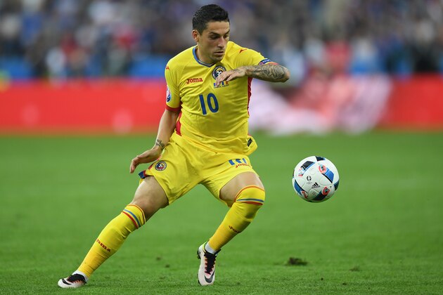 PARIS, FRANCE - JUNE 10:  Nicolae Stanciu of Romania in action during the UEFA Euro 2016 Group A match between France and Romania at Stade de France on June 10, 2016 in Paris, France.  (Photo by Shaun Botterill/Getty Images)